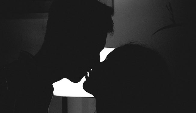 a shot of an intimate couple in a dark room – Dr. Dabber