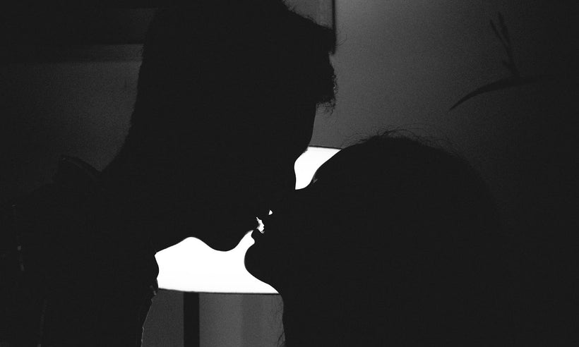 a shot of an intimate couple in a dark room – Dr. Dabber