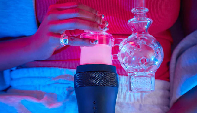 a woman holds the Switch® vaporizer - Dr. Dabber