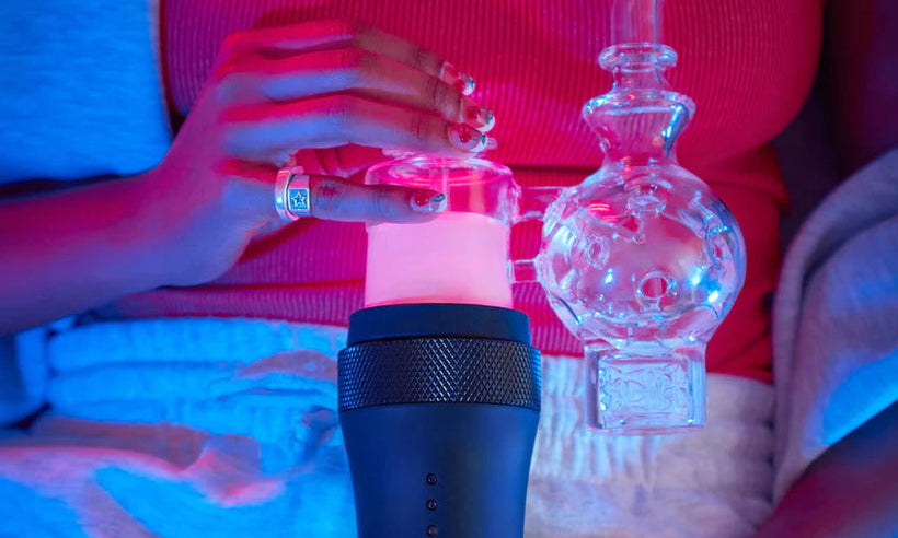 a woman holds the Switch® vaporizer - Dr. Dabber